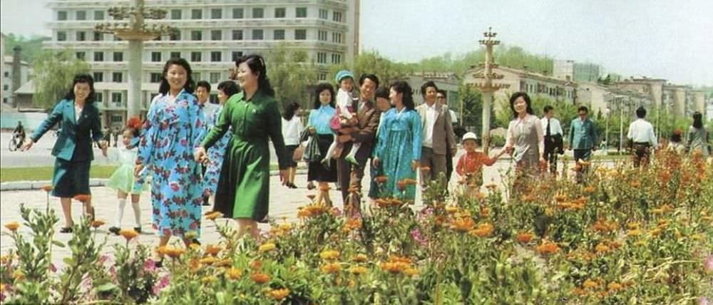 Parents and children attending the Songdowon International Children's Camp, held in Pyongyang, 1989. The camp is largely aimed a foreign visitors, and so was advertised in tourist brochure.