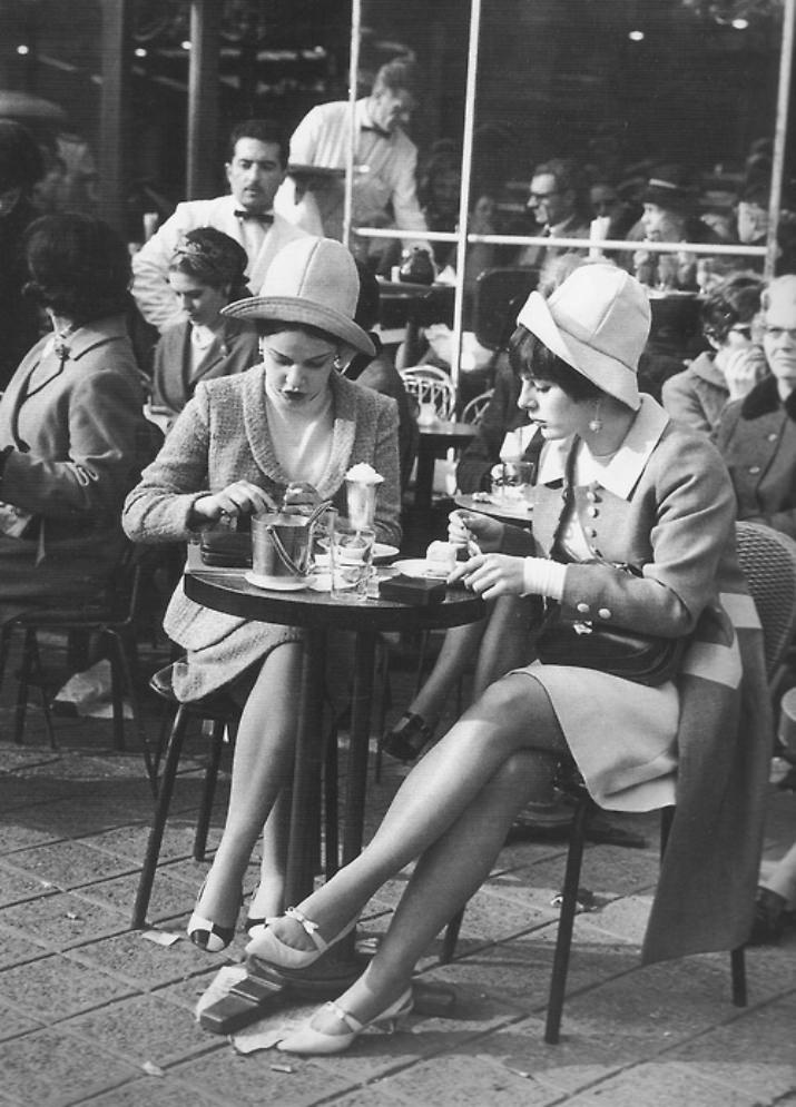 Two fine ladies at a cafe on the Champs-Élysées, ca. 1960s.