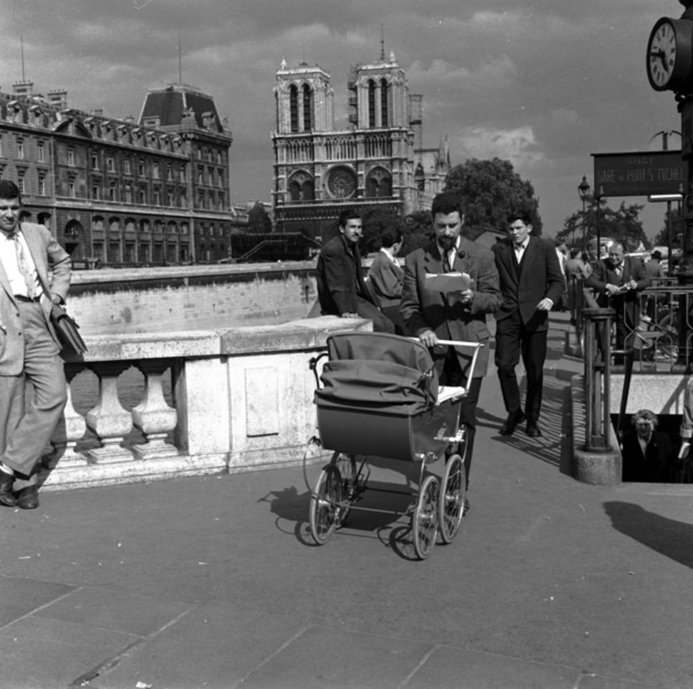 Menfolk in Paris do their part, 1955.