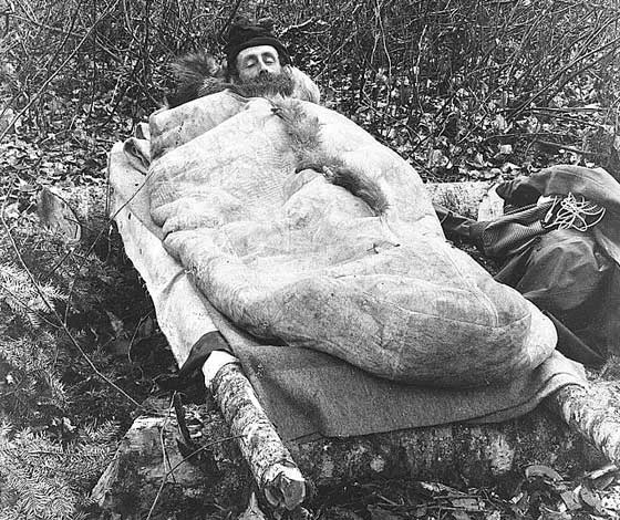 Sleeping in an animal skin sleeping bag, 1888.