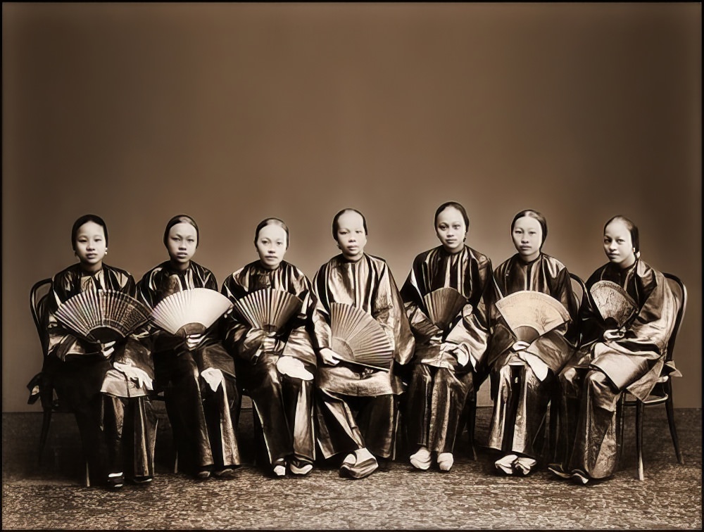 A group of Chinese women with fans, Canton, 1880.