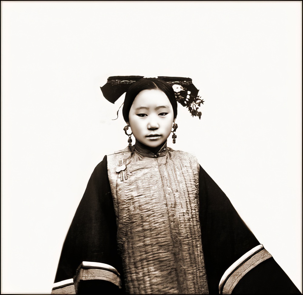 A Manchu woman's coiffure, Peking, 1869.