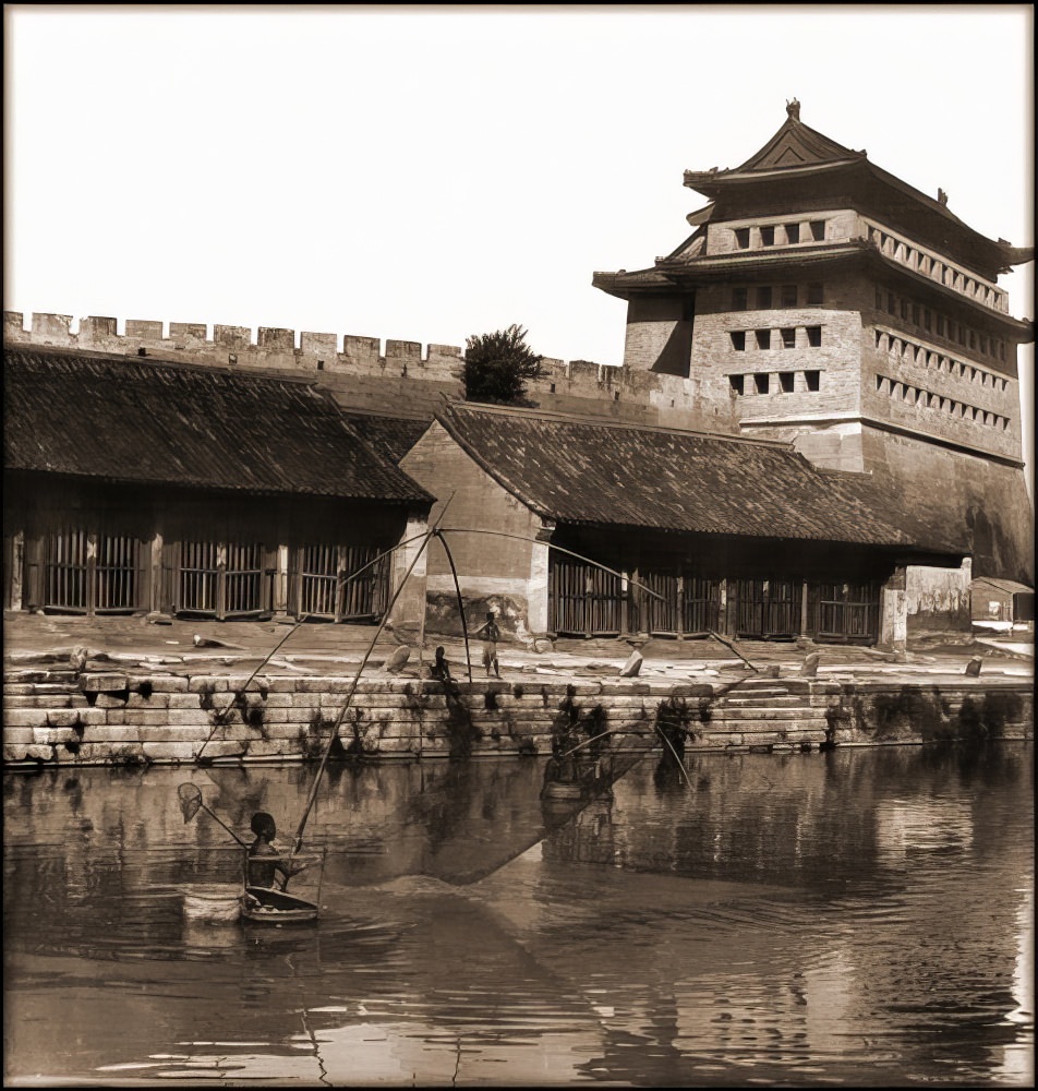 Fisherman in Grand Canal, Peking, 1907.