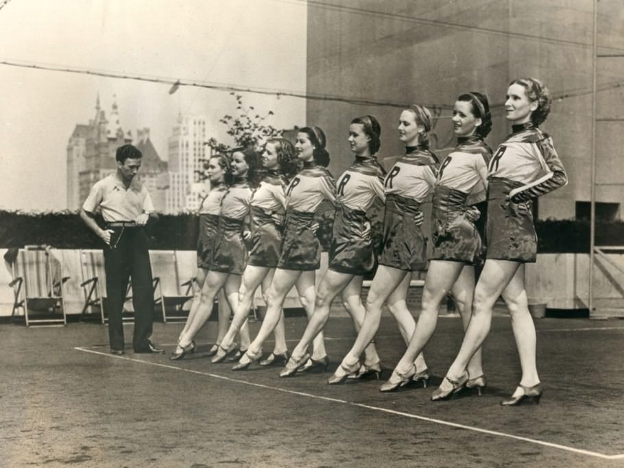 Even in the beginning, there were strict standards for height, physique, and flexibility—here, a rehearsal in cheerleader-esque sweaters and skirts