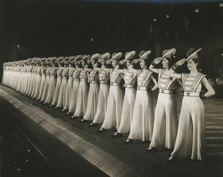 Standing at attention as sailors in the 1940s.