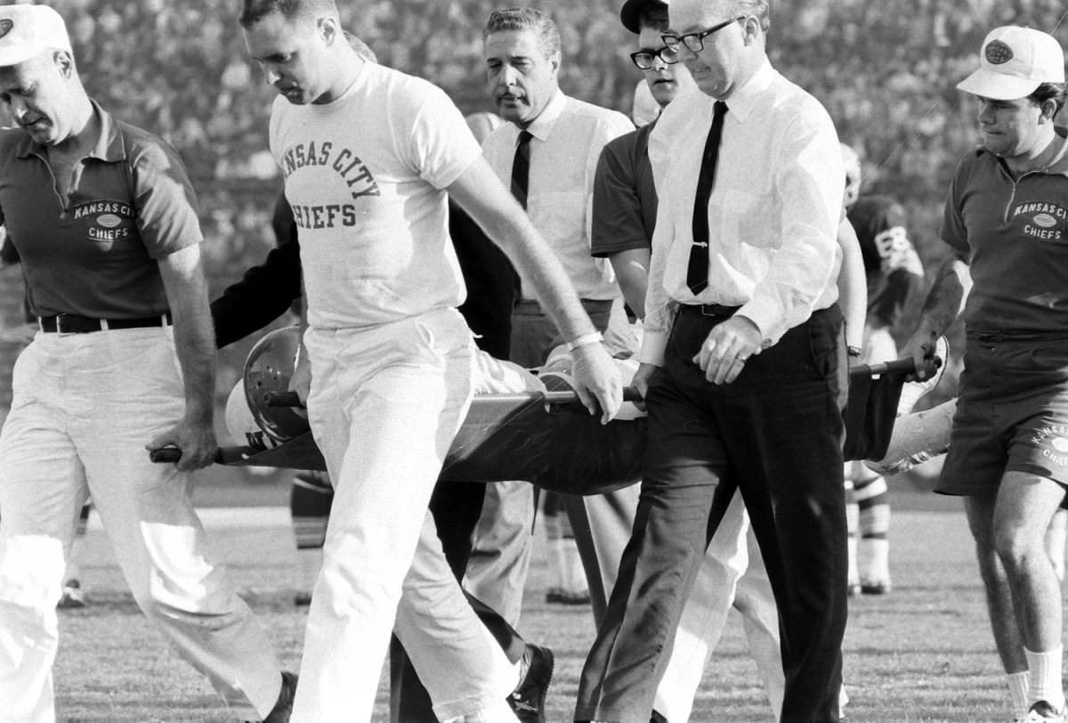 Kansas City's injured Fred Williamson carried off the field, Super Bowl I, 1967