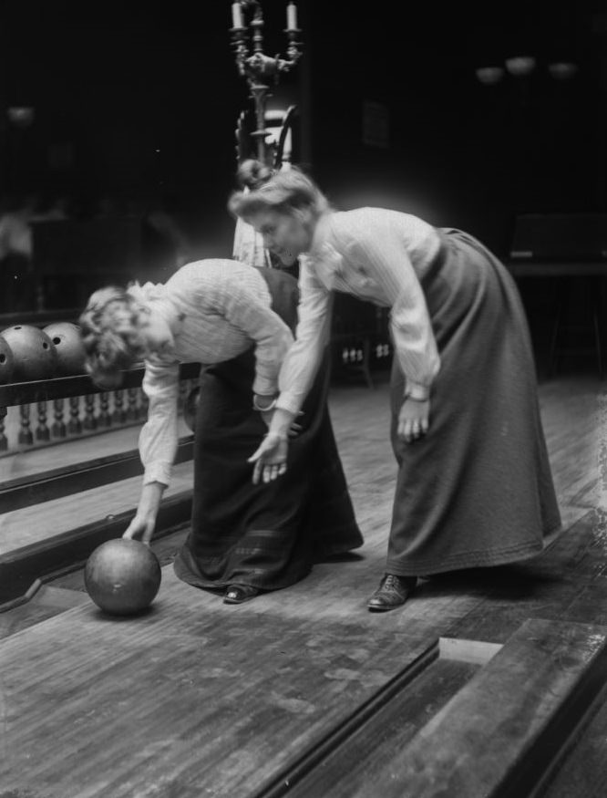 Women bowling.