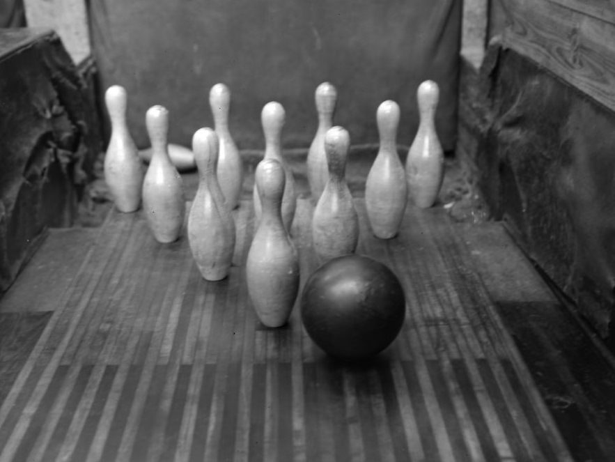 Women bowling.