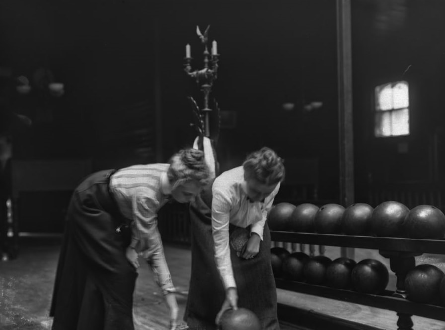 Women bowling.