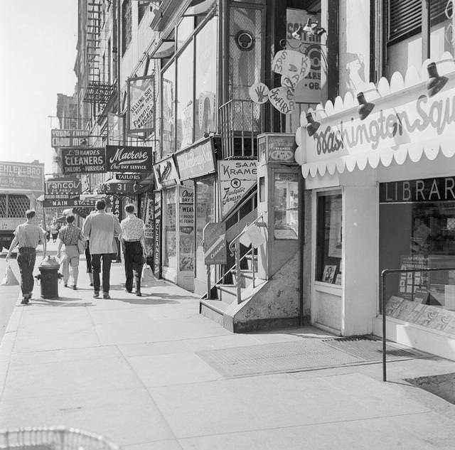 Eighth Street, the arterial street of Greenwich Village, New York, 1955.