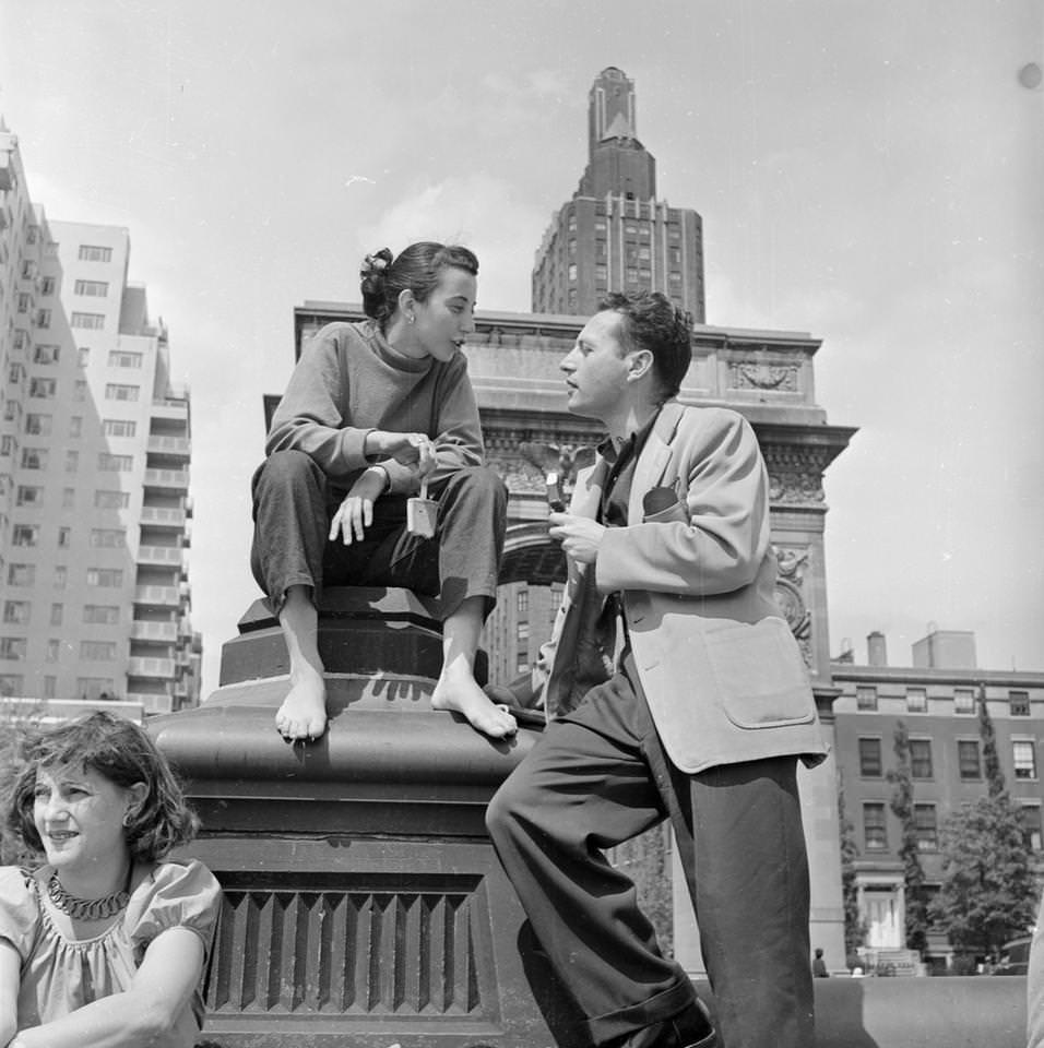 A young couple in conversation in Washington Square, 1952.