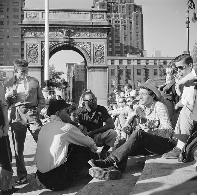 People listening to folk singer Ramblin' Jack Elliott in Washington Square, Greenwich Village, 1955.