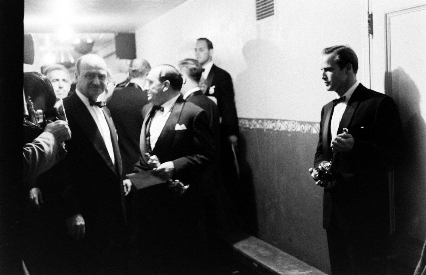 Marlon Brando (right) with his Oscar for On the Waterfront, 1955.