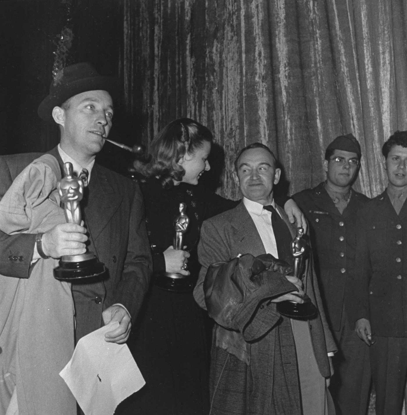 Bing Crosby (Going My Way), Ingrid Bergman (Gaslight) and Barry Fitzgerald (Going My Way) with their Oscars, 1945.